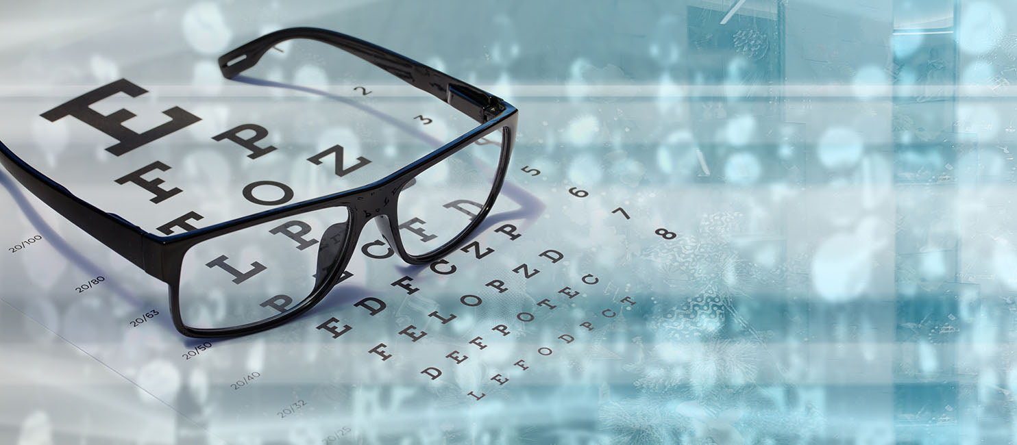 Eye exams in ocean city
Eyeglasses on an eye test chart with a blurred digital background
