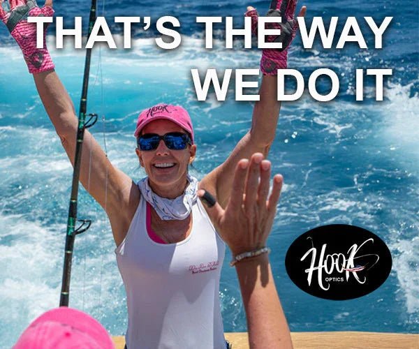 Celebrating catching a fish and see the World Differently with Hook Optics Polarized Sunglasses