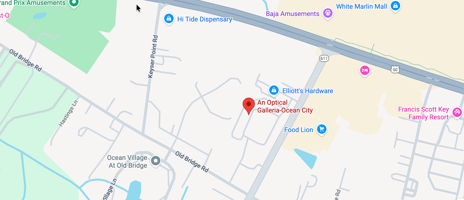 Map of a coastal area with various locations marked, direction to  An Optical Galleria'.